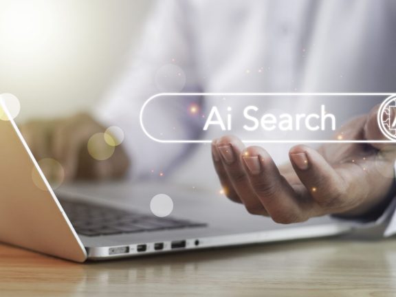 AI searching concept. Data search optimization by artificial intelligence technology. Search engine bar with blank space for text and AI button appear while business person typing on laptop computer