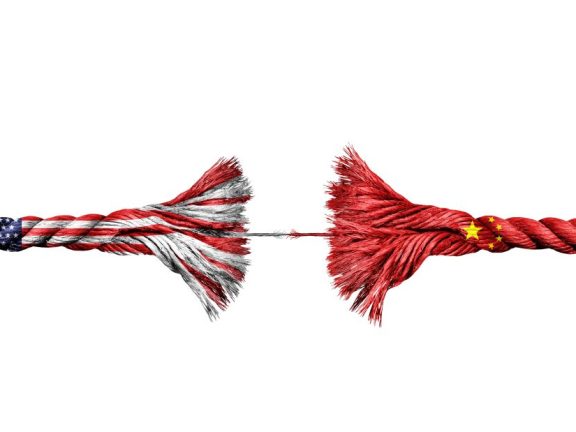 China US Diplomatic Crisis concept as a Broken Rope representing decoupling as a metaphor for economic trade war and political relationship between Beijing and Washington due to Tariffs and geopolitical disputes.