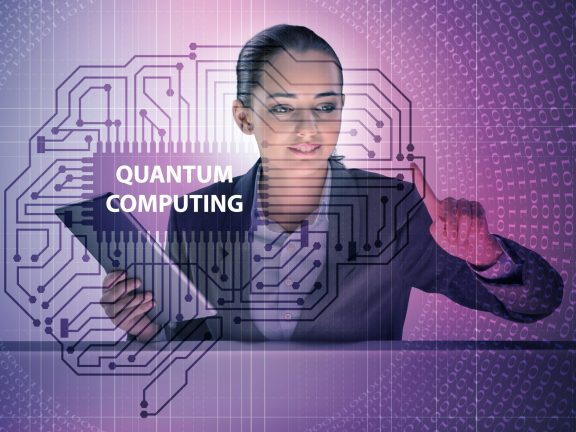 Businesswoman pressing virtual button in quantum computing concept