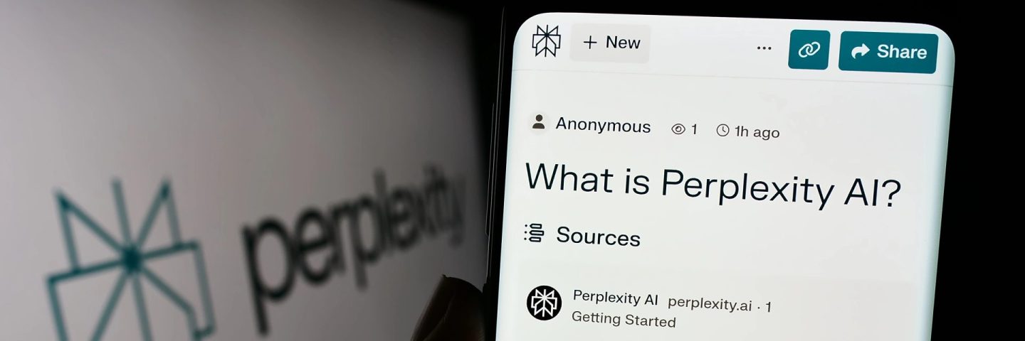 Stuttgart, Germany - 02-16-2024: Person holding smartphone with webpage of US artificial intelligence company Perplexity AI in front of logo. Focus on center of phone display.