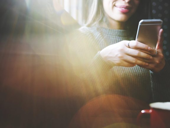 Asian  woman Browsing Mobile Phone