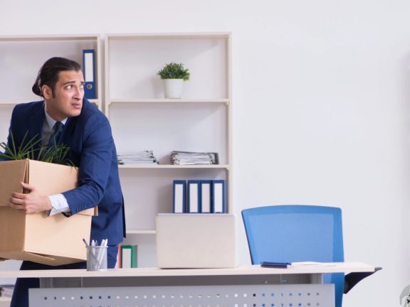 Concept of robots replacing humans in offices