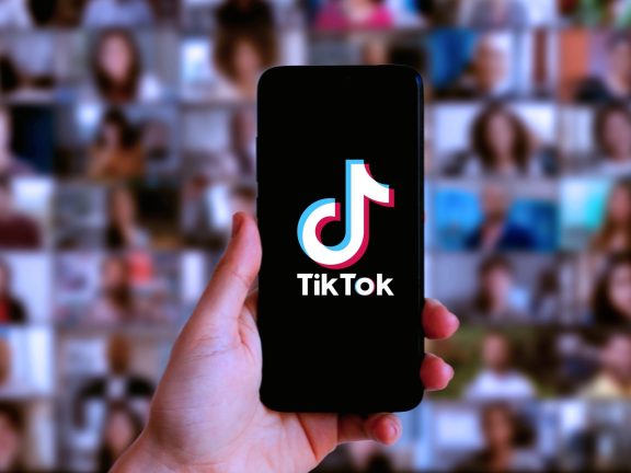 Smart phone with TIK TOK logo, which is a popular social network on the internet.United States, Canada, Wednesday, January 27, 2022