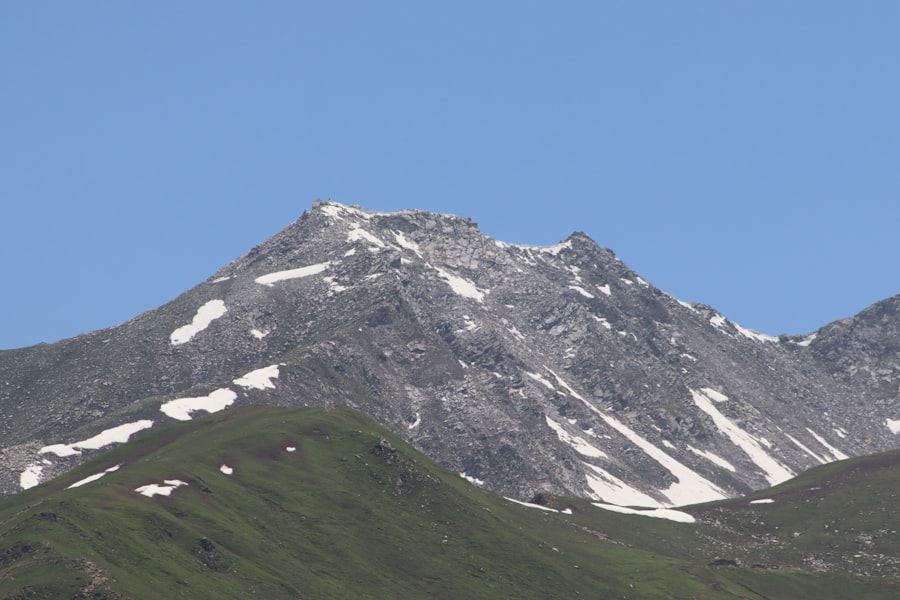 Photo Brand logo on top of a mountain