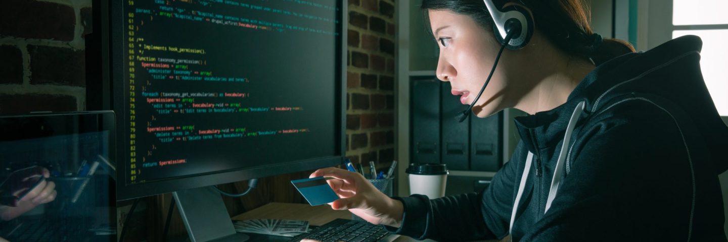 beauty attractive hacker woman wearing headphone