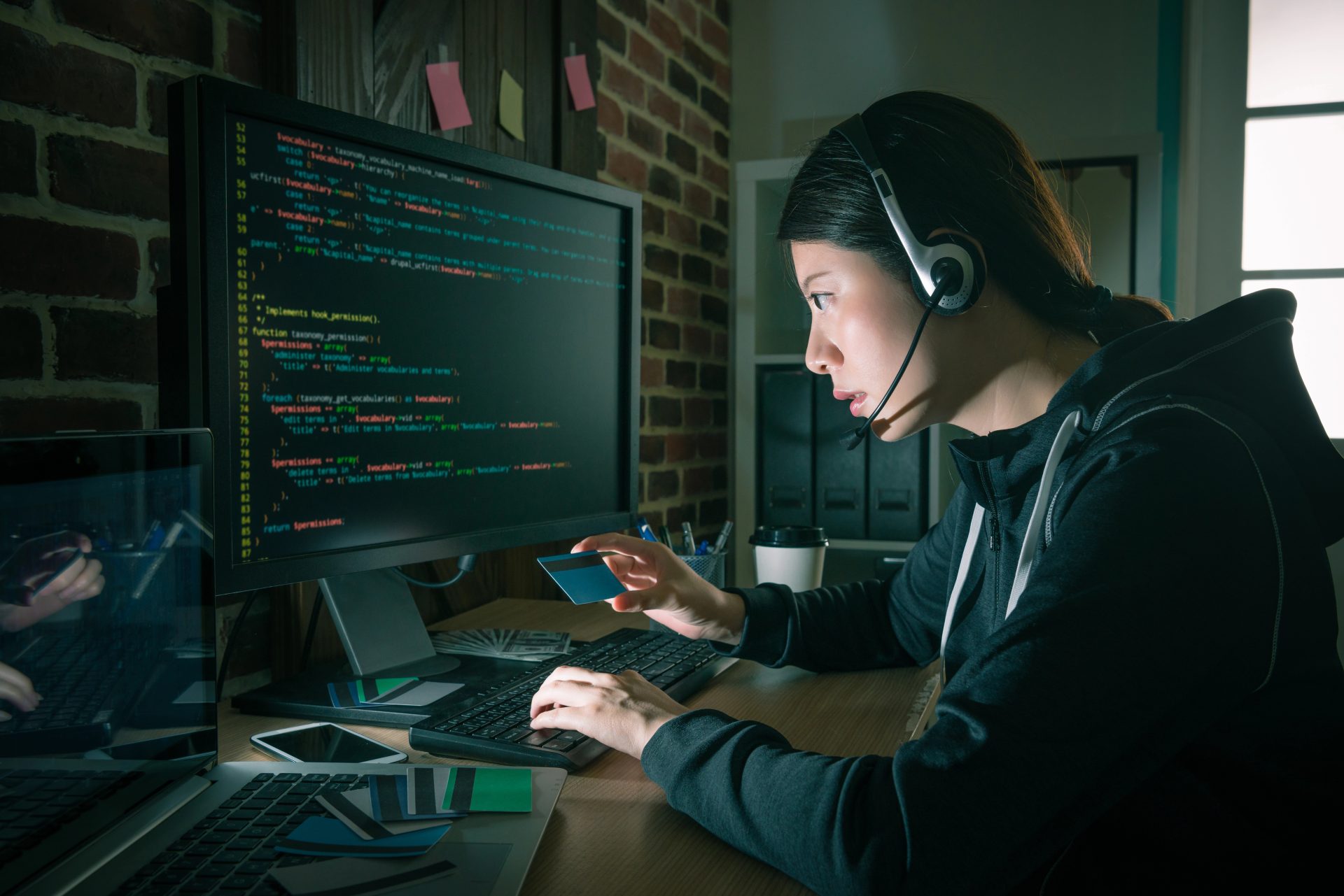 beauty attractive hacker woman wearing headphone
