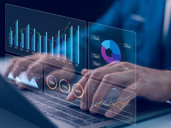 Data analytics automated with AI technology. Dashboard report KPI insights. Analyst use computer datum business analysis and Management System with KPI and metrics connected to the database.