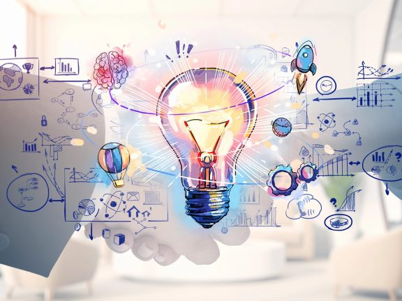 Businessman and businesswoman shaking hands and lightbulb drawing with circuit of network connection, icons of communication and analysis. Concept of business deal and agreement