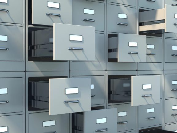 Data archive storage. Gray filing cabinets with open drawers background. Office document data, bureaucracy and business administration concept. 3d illustration