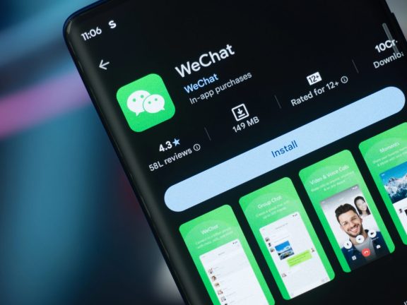 Dhaka, Bangladesh 07 Dec 2025:WeChat logo on screen. WeChat is a Chinese app that combines messaging, social media, payment, and content sharing.