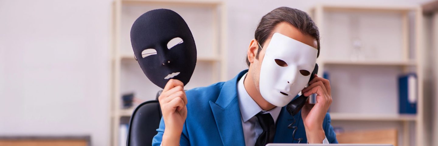 Young male employee wearing masks in the office