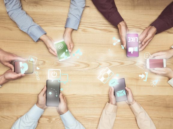 businesspeople using social media