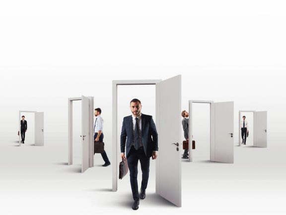 Businessmen choosing  the right door