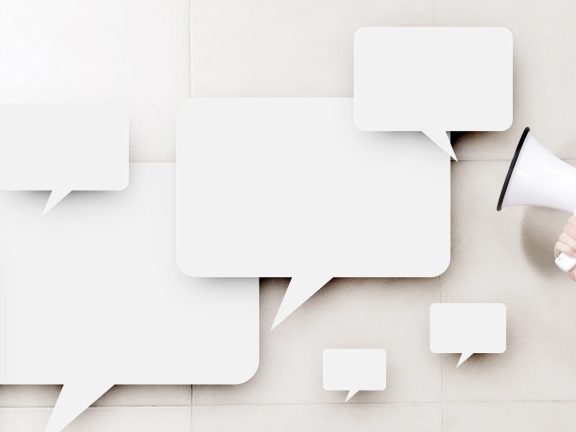 Businessman holding megaphone