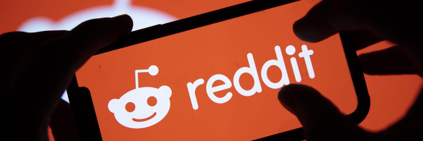 LONDON, UK - February 2021: Reddit logo displayed on a smartphone device