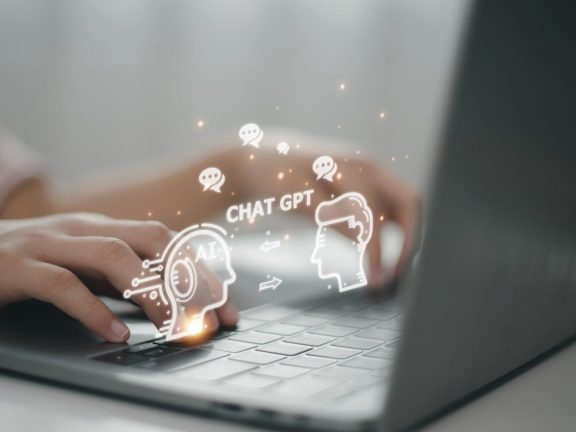 ChatGPT Chat with AI or Artificial Intelligence. woman chatting with a smart AI or artificial intelligence using an artificial intelligence chatbot developed by OpenAI.